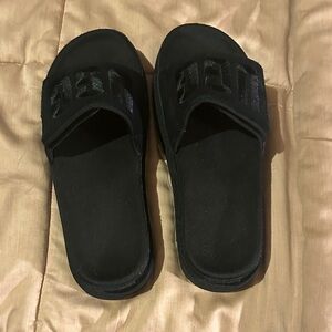 Black UGG Slide Sandals